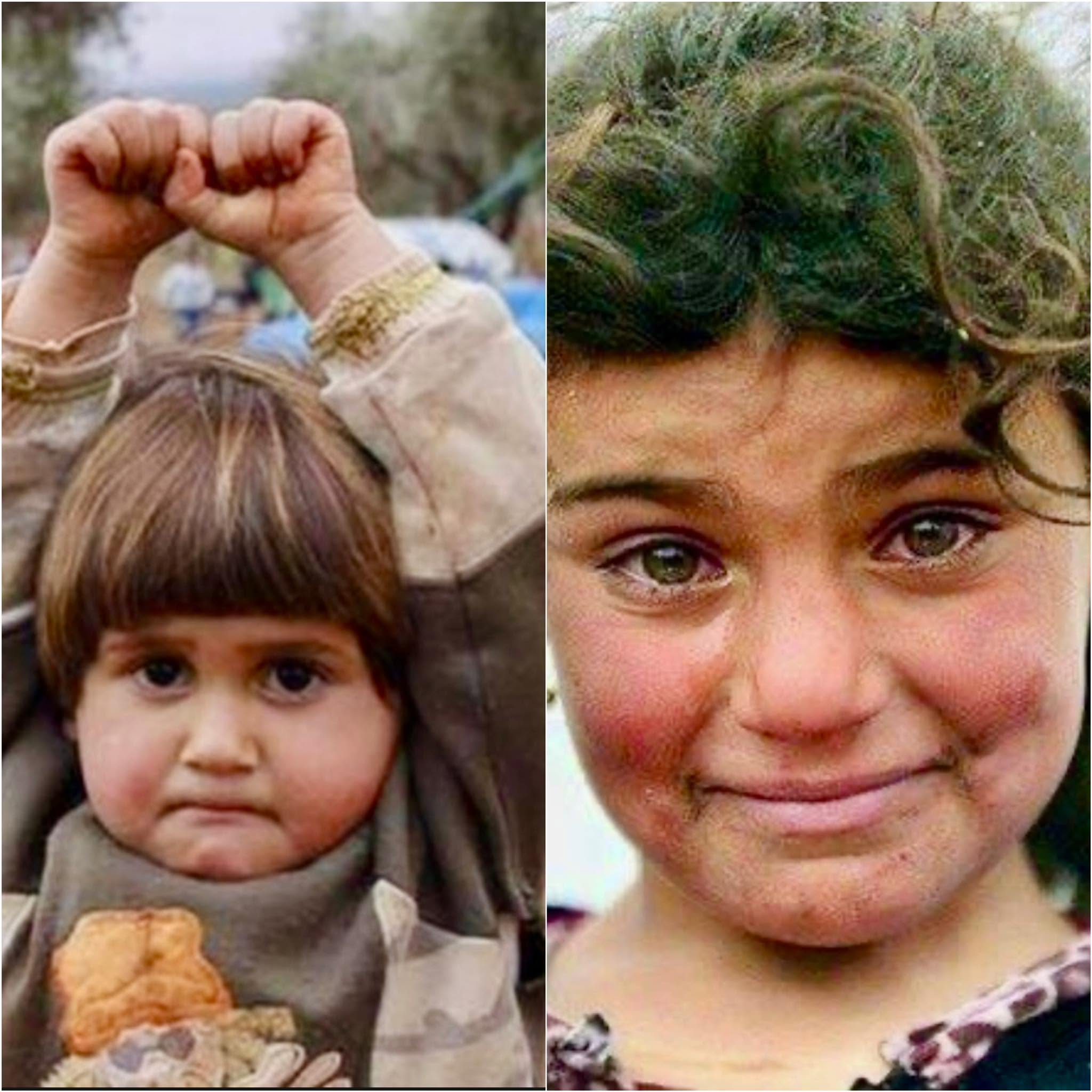 La chica siria observa al fotógrafo y, confundiendo la cámara con un arma, levanta sus manitos en señal de rendición